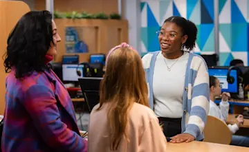 Explore Learning Centre Director talking to a family